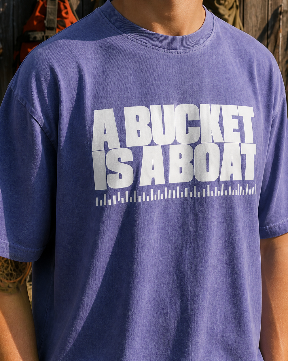 A Bucket Is A Boat washed tee — washed blue, worn, side