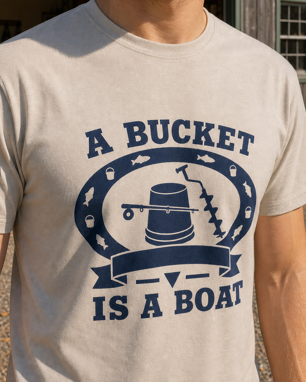 A Bucket Is A Boat Heritage tee — sand, worn, side