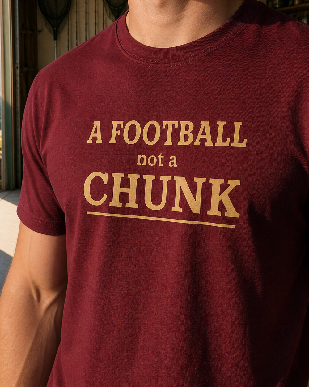A Football Not A Chunk Stacked tee — worn, side