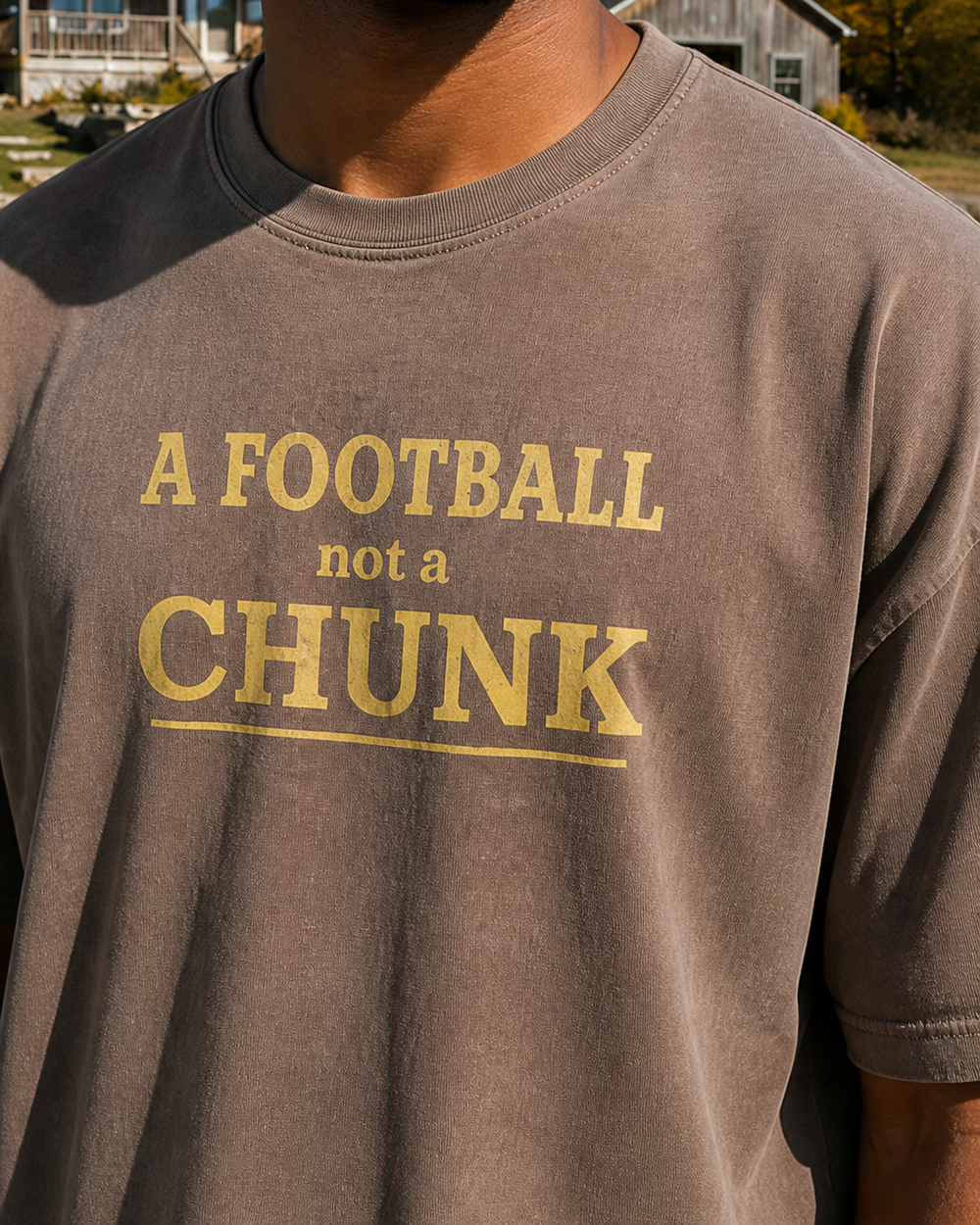 A Football Not A Chunk Stacked washed tee — washed coffee, worn, side