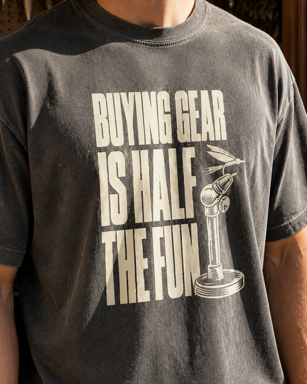 Buying Gear Is Half the Fun washed tee — washed black, worn, side