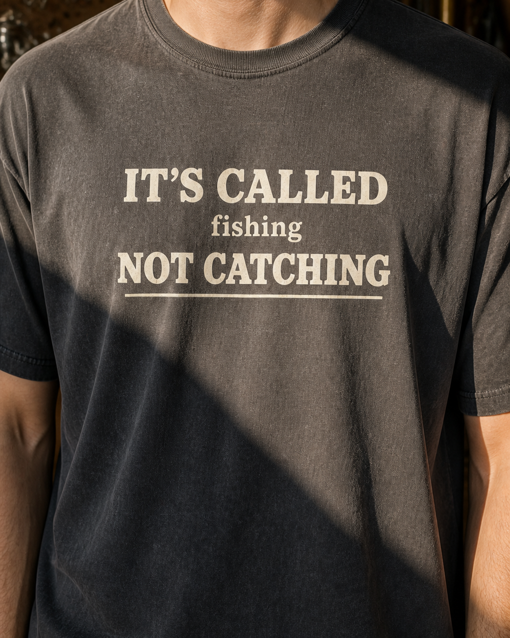 Called Fishing washed tee — washed black, worn, side