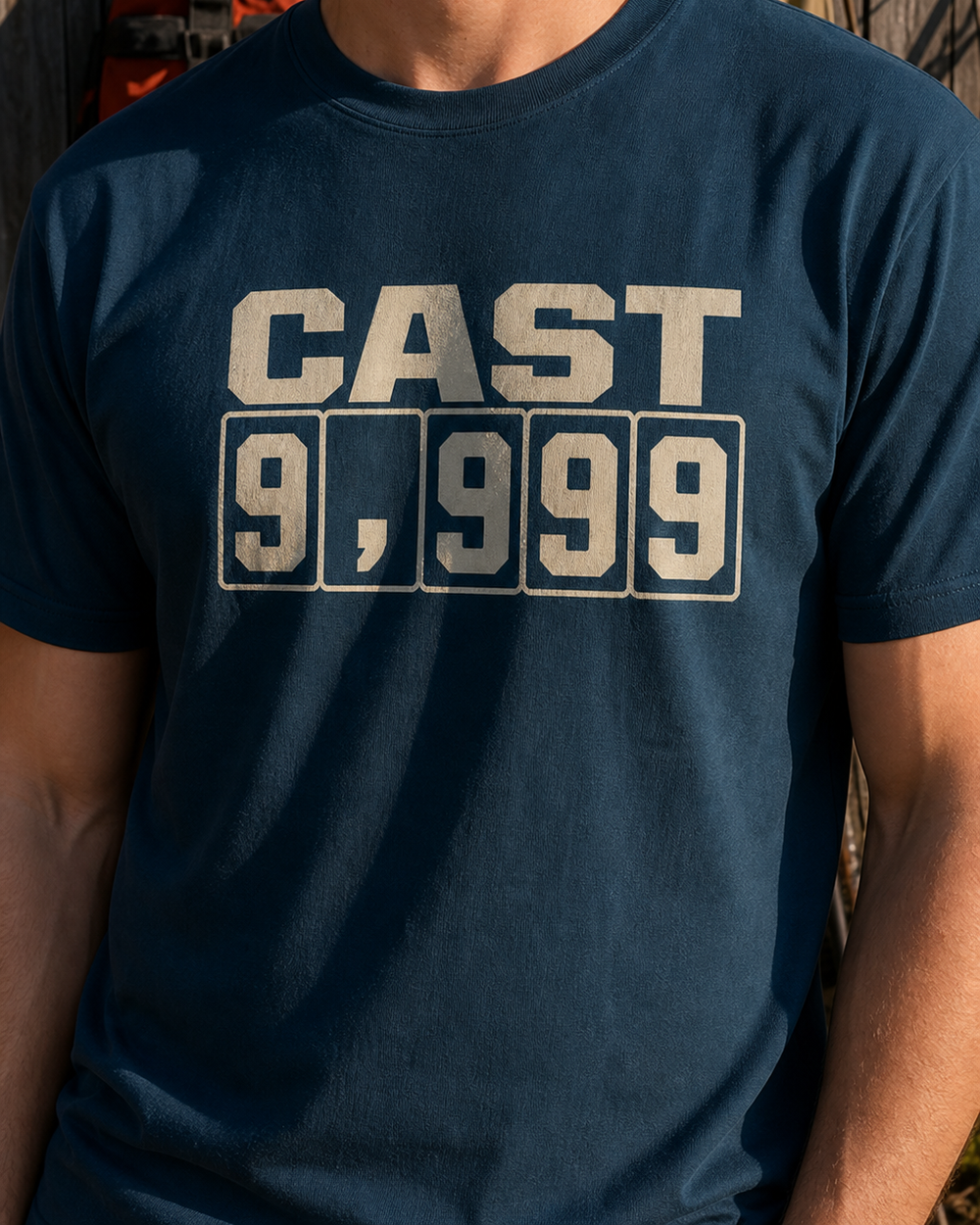 Cast 9,999 tee — midnight navy, worn, side