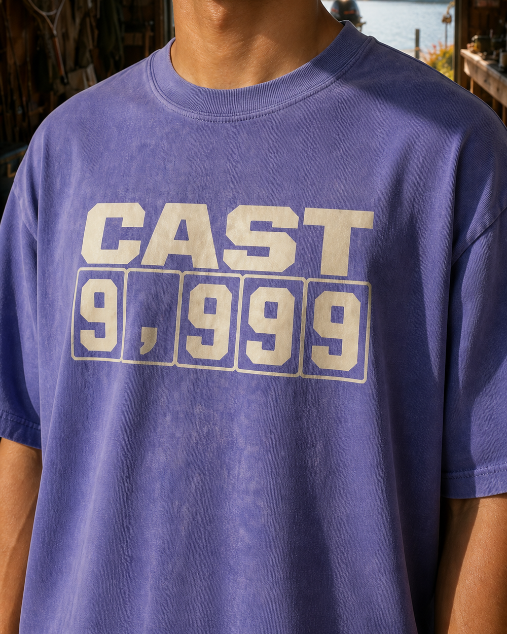 Cast 9,999 washed tee — washed blue, worn, side