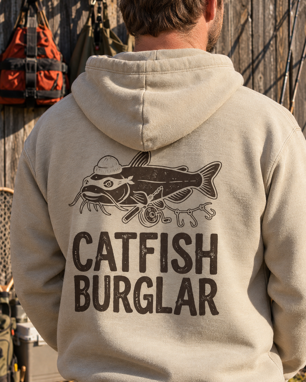 Catfish Burglar Masked Hoodie — Sand — model back close-up