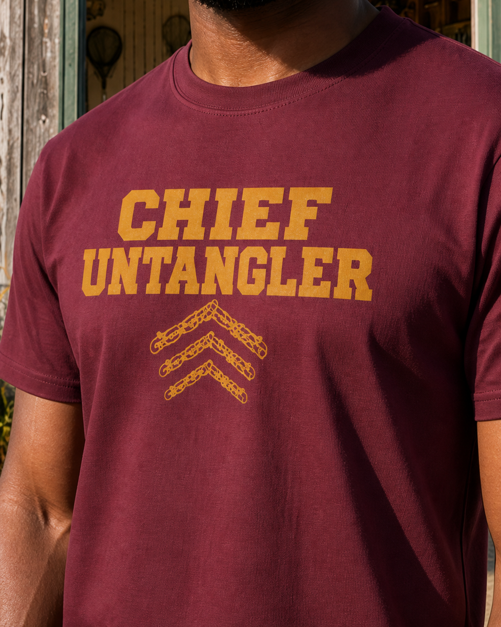 Chief Untangler tee — maroon, worn, side