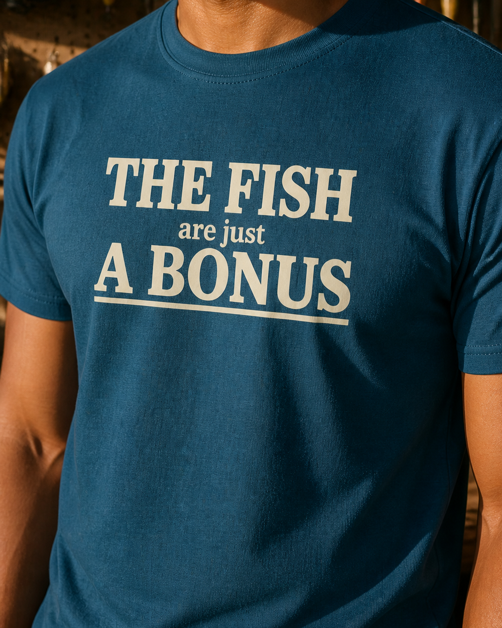 The Fish Are Just A Bonus tee — midnight navy, worn, side