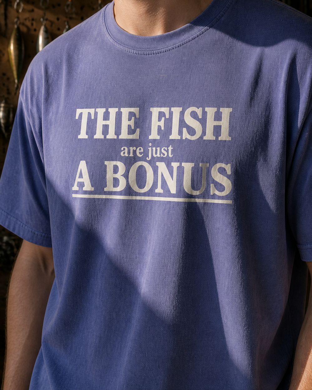 The Fish Are Just A Bonus washed tee — washed blue, worn, side