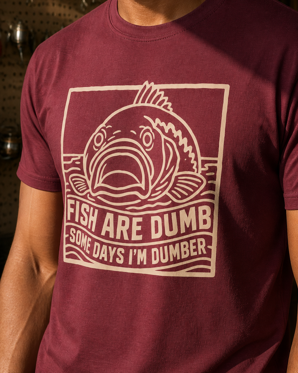 Fish Are Dumb Etched tee — maroon, worn, side