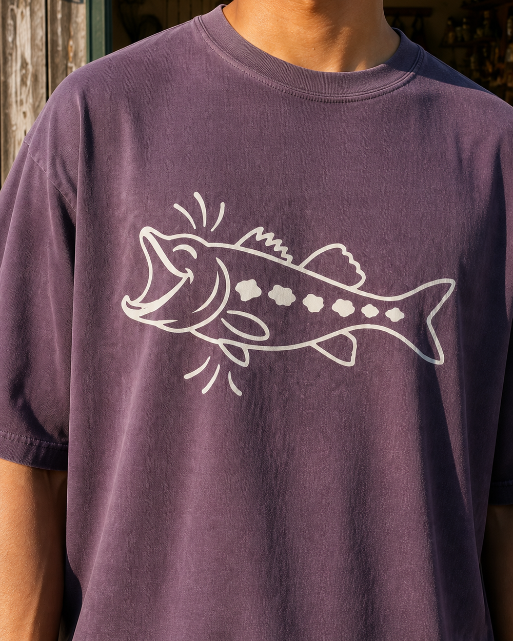 Laughing Fish washed tee — washed violet, worn, side
