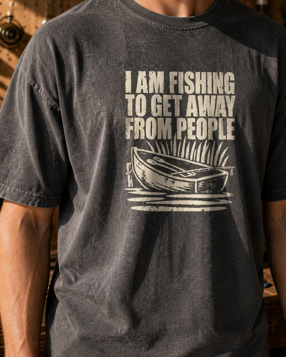I Am Fishing to Get Away From People washed tee — washed black, worn, side