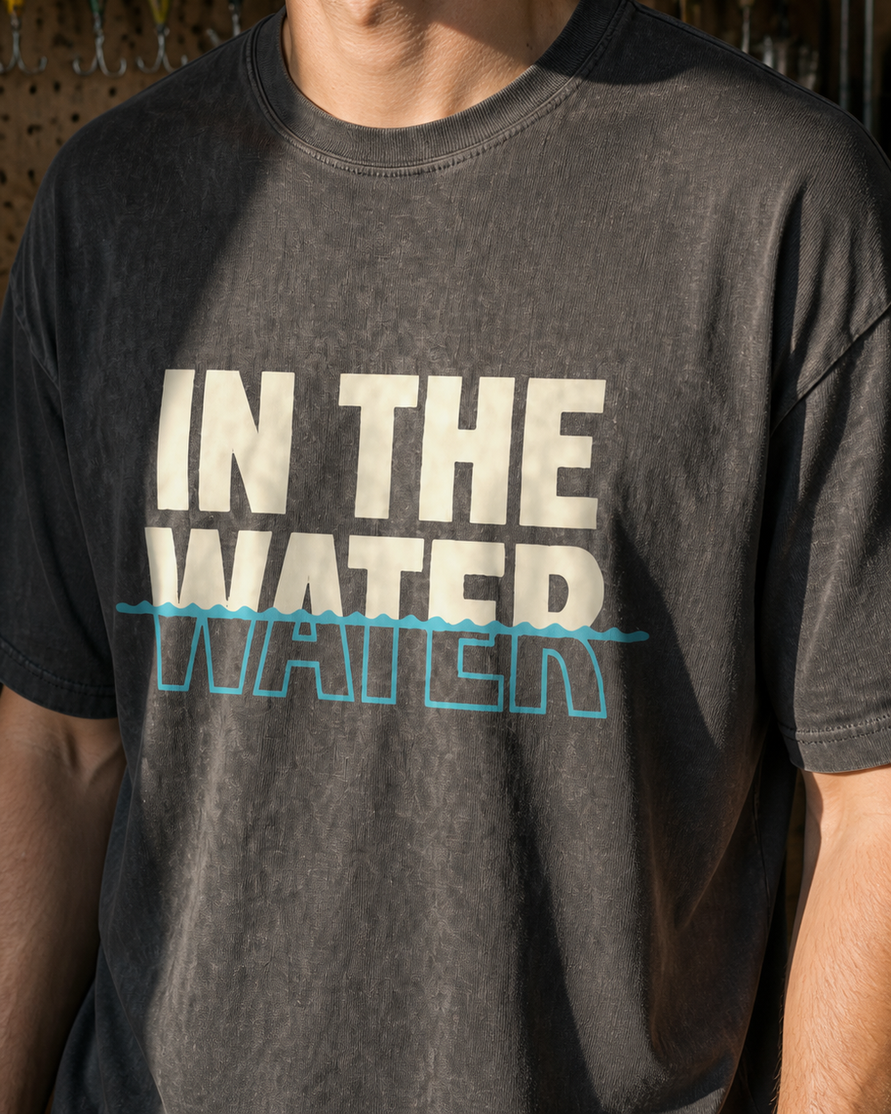 In The Water washed tee — washed black, worn, side