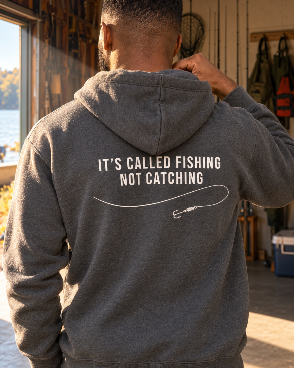 It's Called Fishing, Not Catching Hoodie — Charcoal — model back close-up