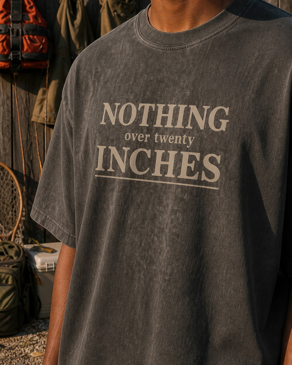 Nothing Over Twenty Inches Stacked washed tee — washed black, worn, side