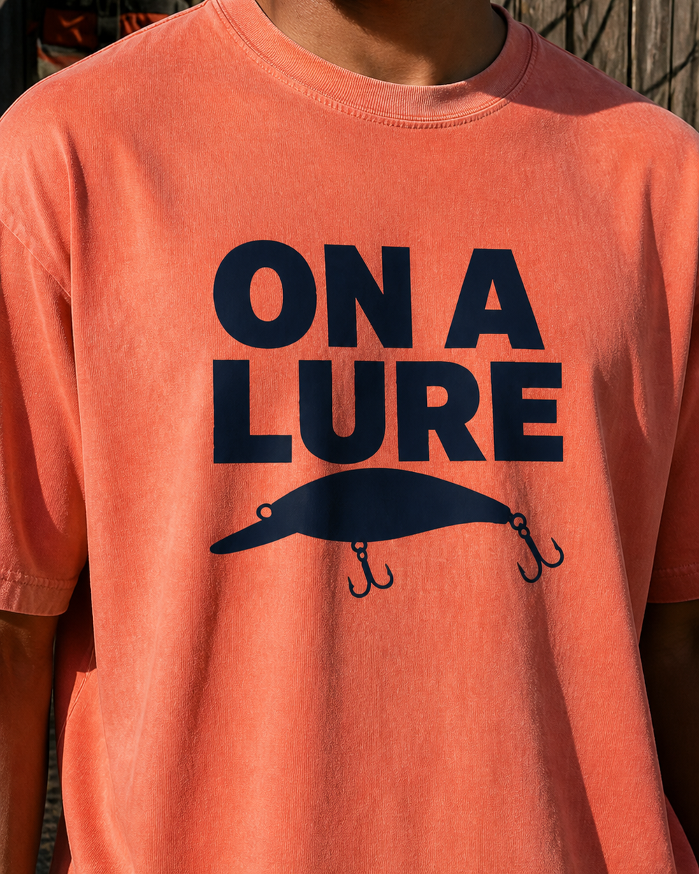On A Lure Bold washed tee — worn, side