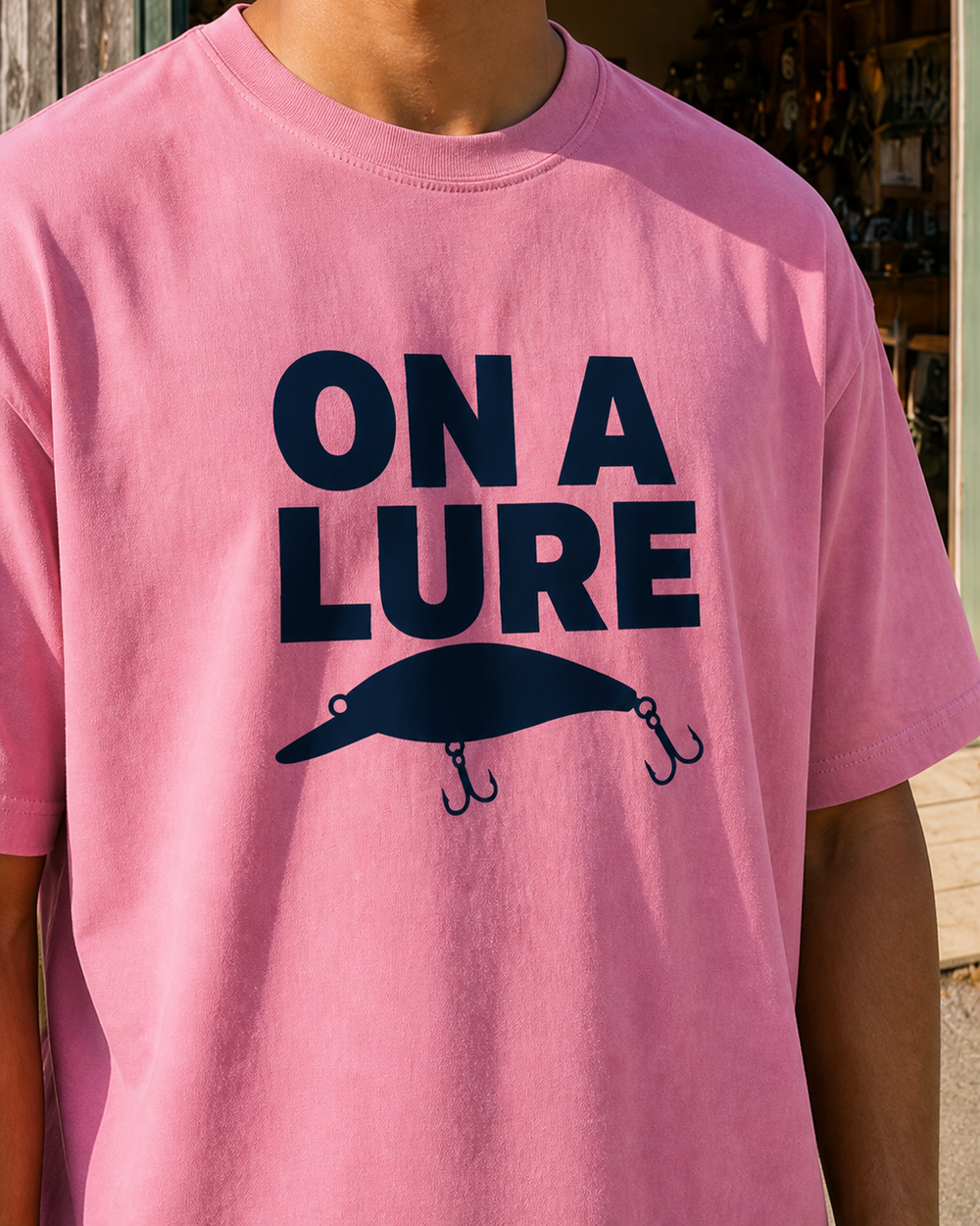 On A Lure Bold washed tee — worn, side
