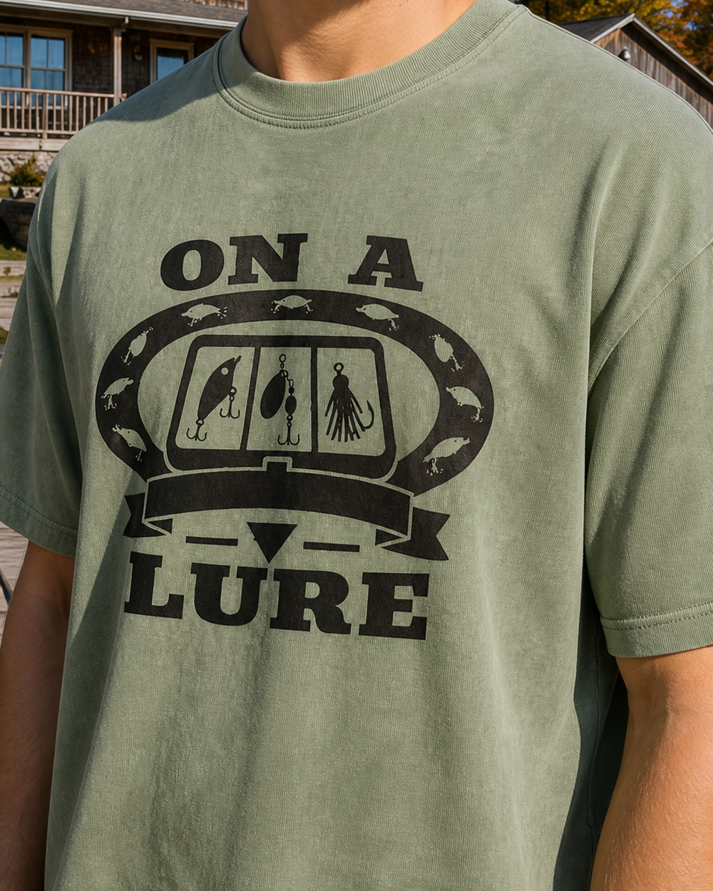 On A Lure Heritage washed tee — washed sage, worn, side