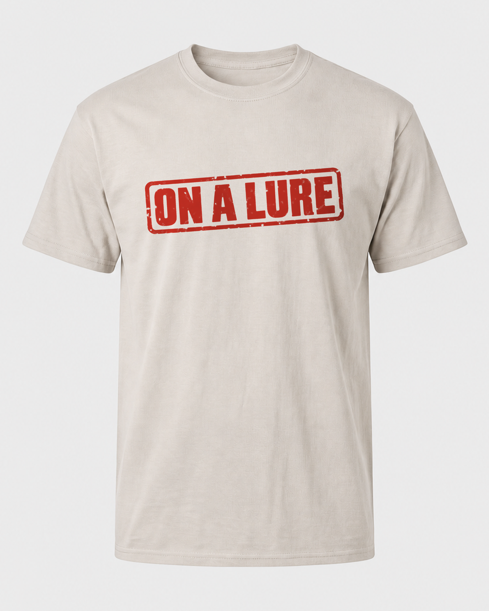 On A Lure tee — sand, front
