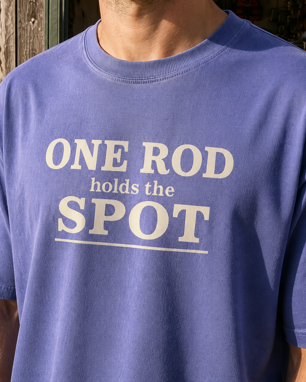 One Rod Holds The Spot Stacked washed tee — washed blue, worn, side