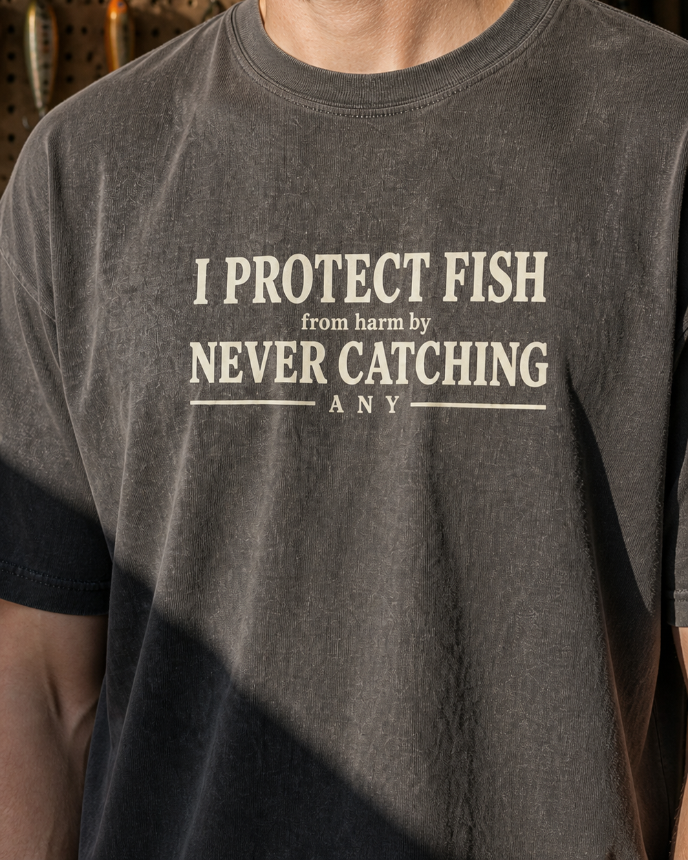 Protect Fish washed tee — washed black, worn, side