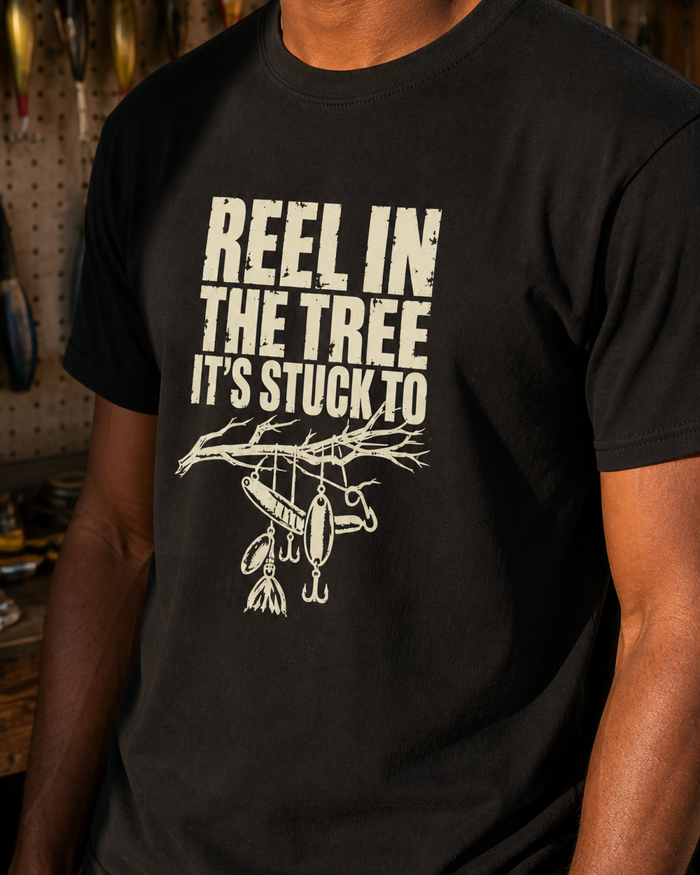 Reel In the Tree It's Stuck To tee — black, worn, side
