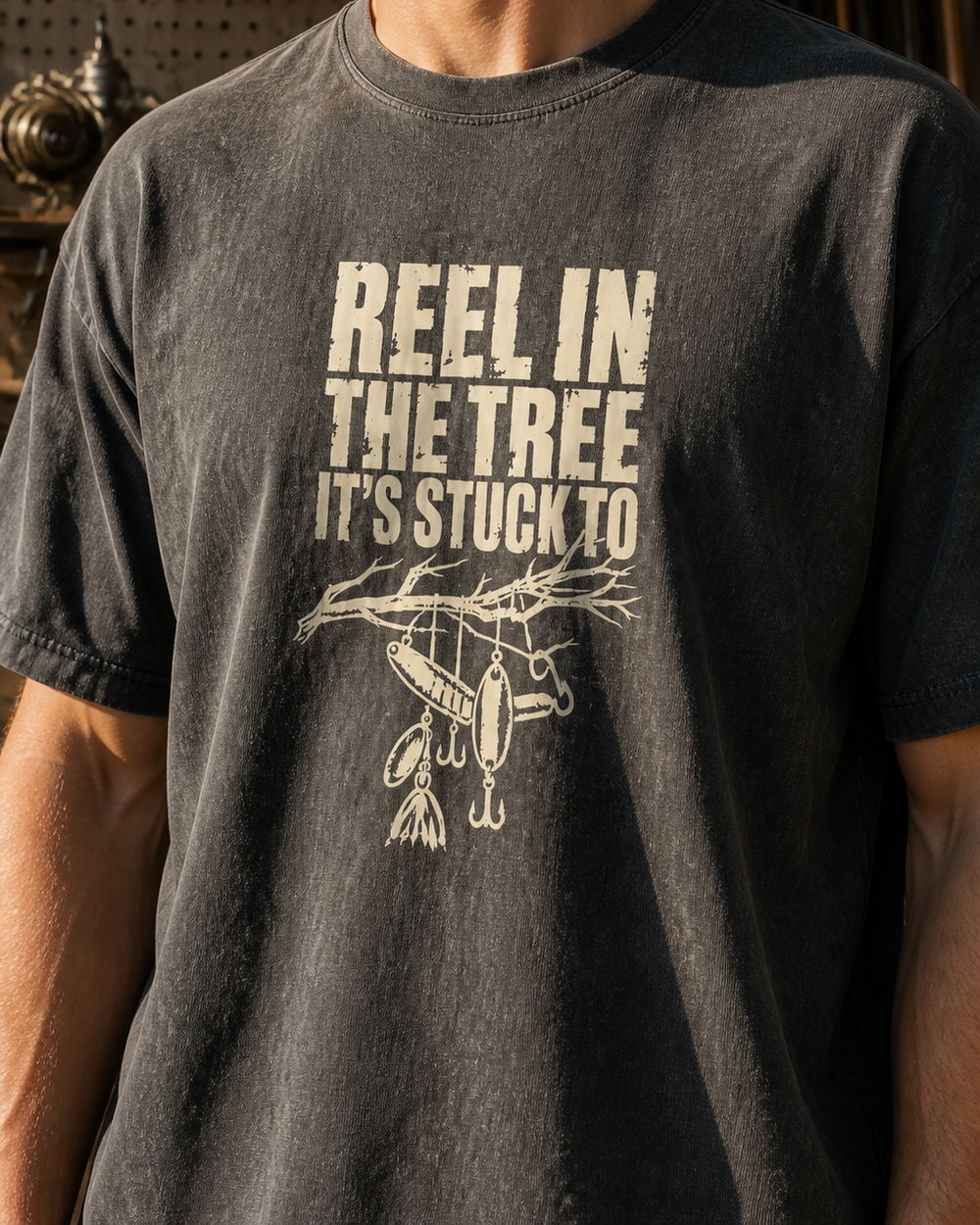 Reel In the Tree It's Stuck To washed tee — washed black, worn, side