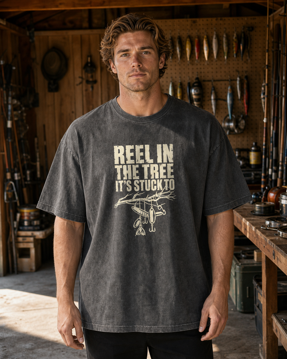Reel In the Tree It's Stuck To washed tee — washed black, worn, front