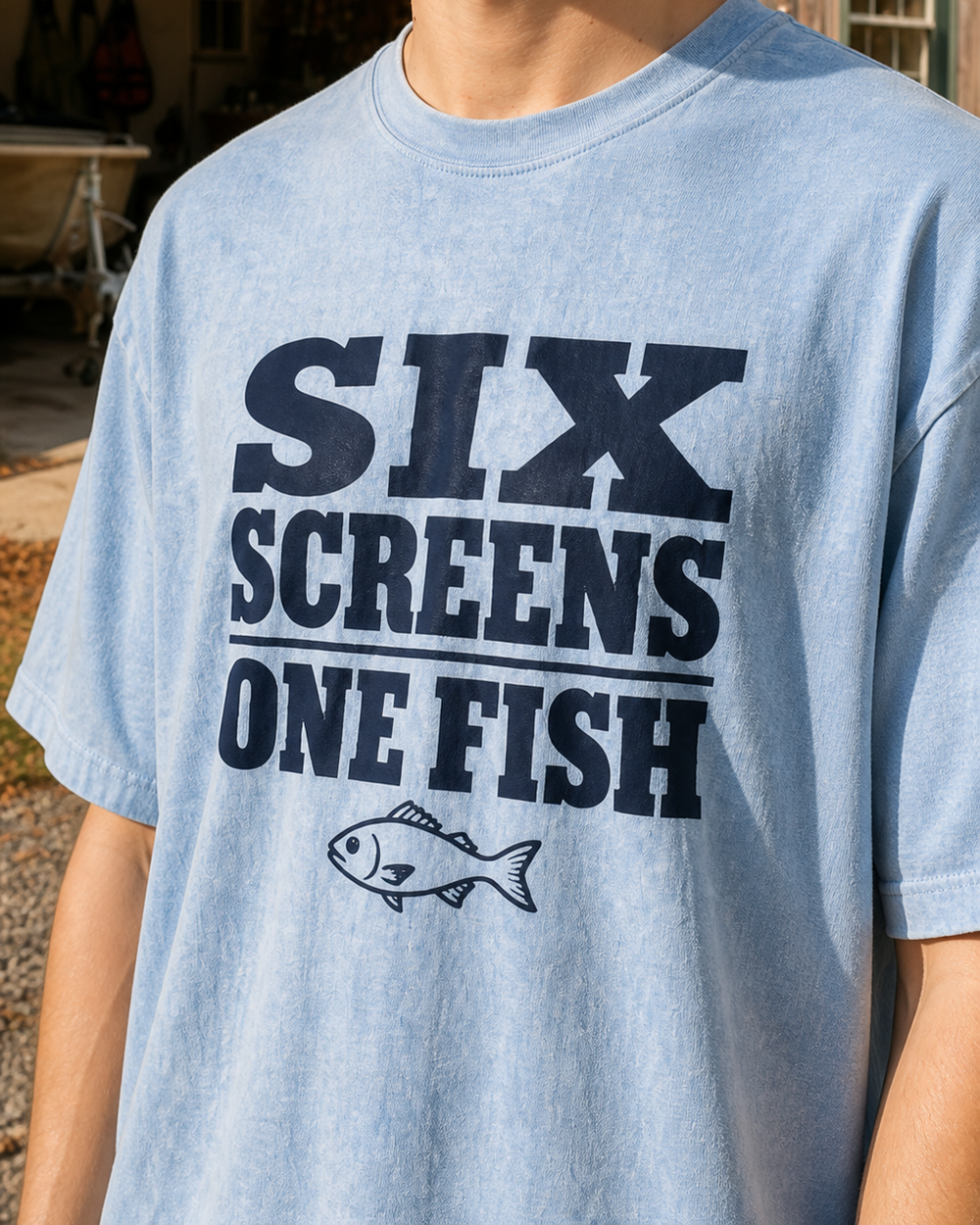 Six Screens One Fish — Poster Print washed tee — washed light blue, worn, side