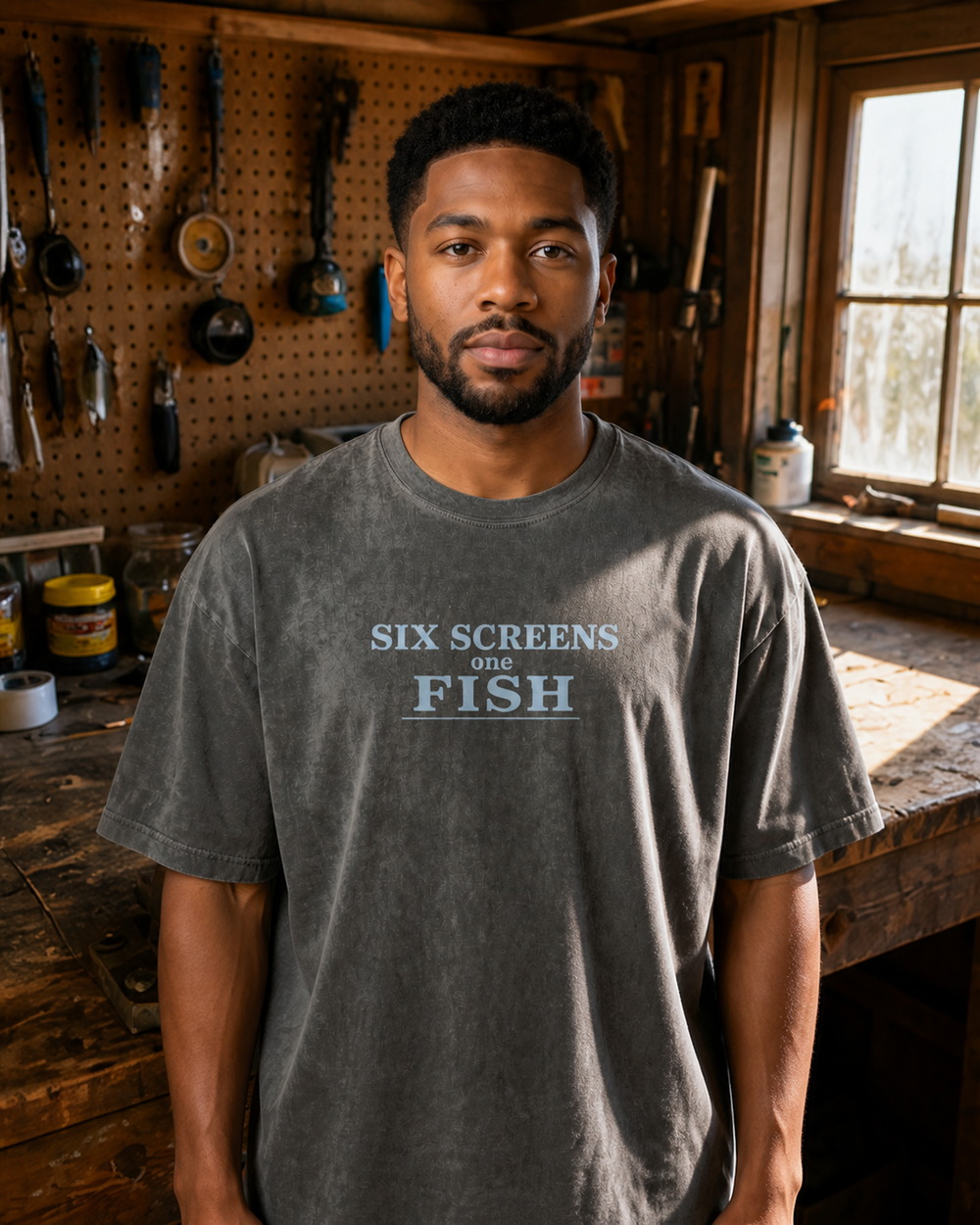 Six Screens One Fish Stacked washed tee — washed black, worn, front