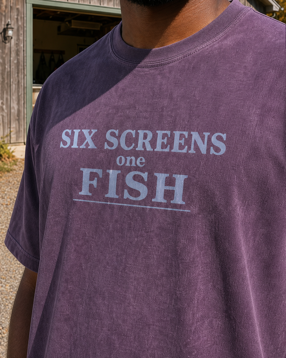Six Screens One Fish Stacked washed tee — washed violet, worn, side