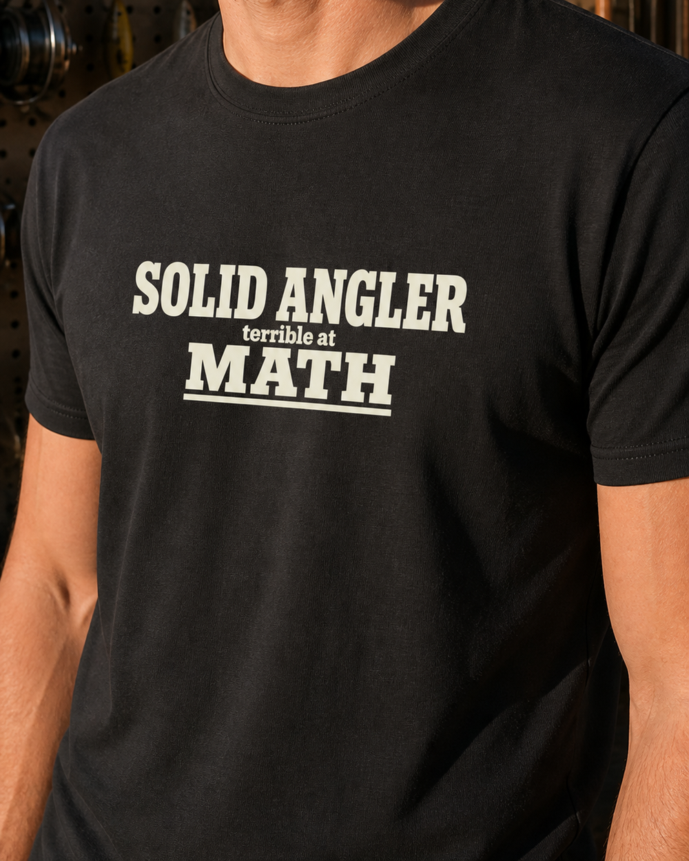 Solid Angler, Terrible At Math tee — black, worn, side