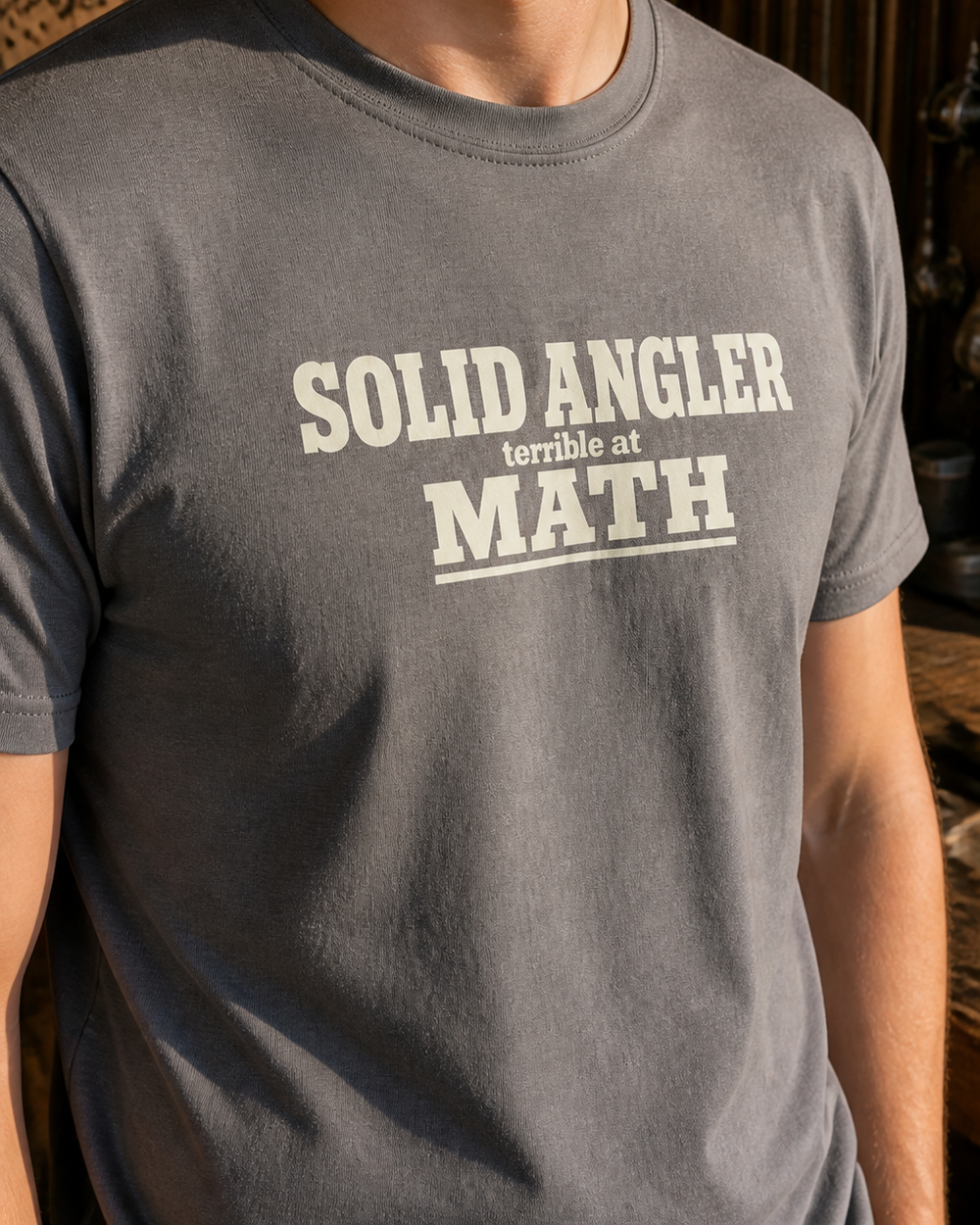 Solid Angler, Terrible At Math tee — graphite heather, worn, side