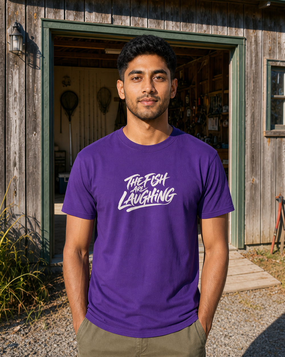The Fish Are Laughing tee — purple, worn, front