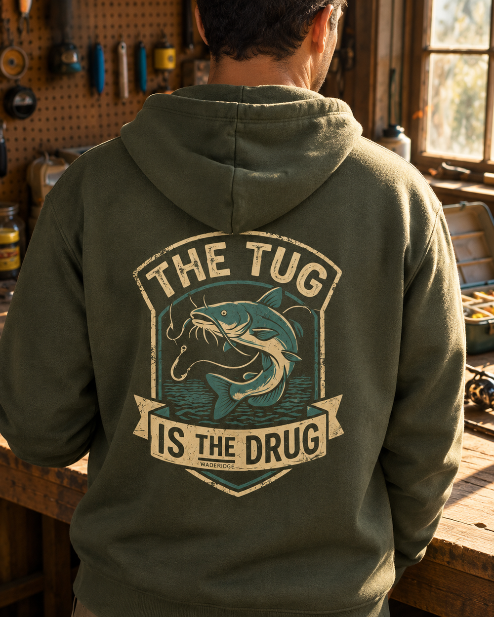 The Tug Is The Drug — Catfish Shield Hoodie — Military Green — model back close-up