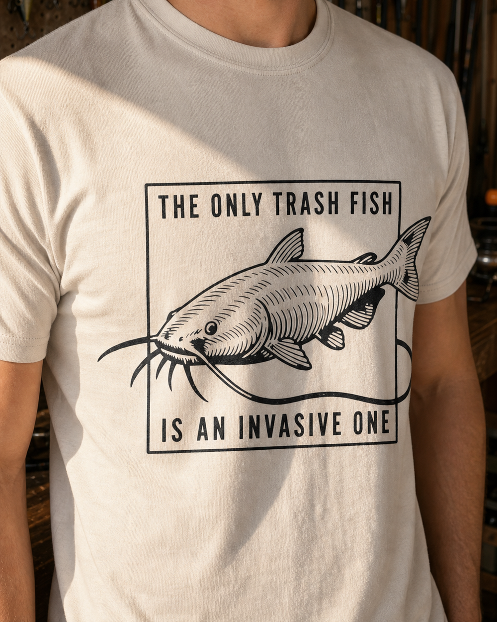 The Only Trash Fish tee — sand, worn, side