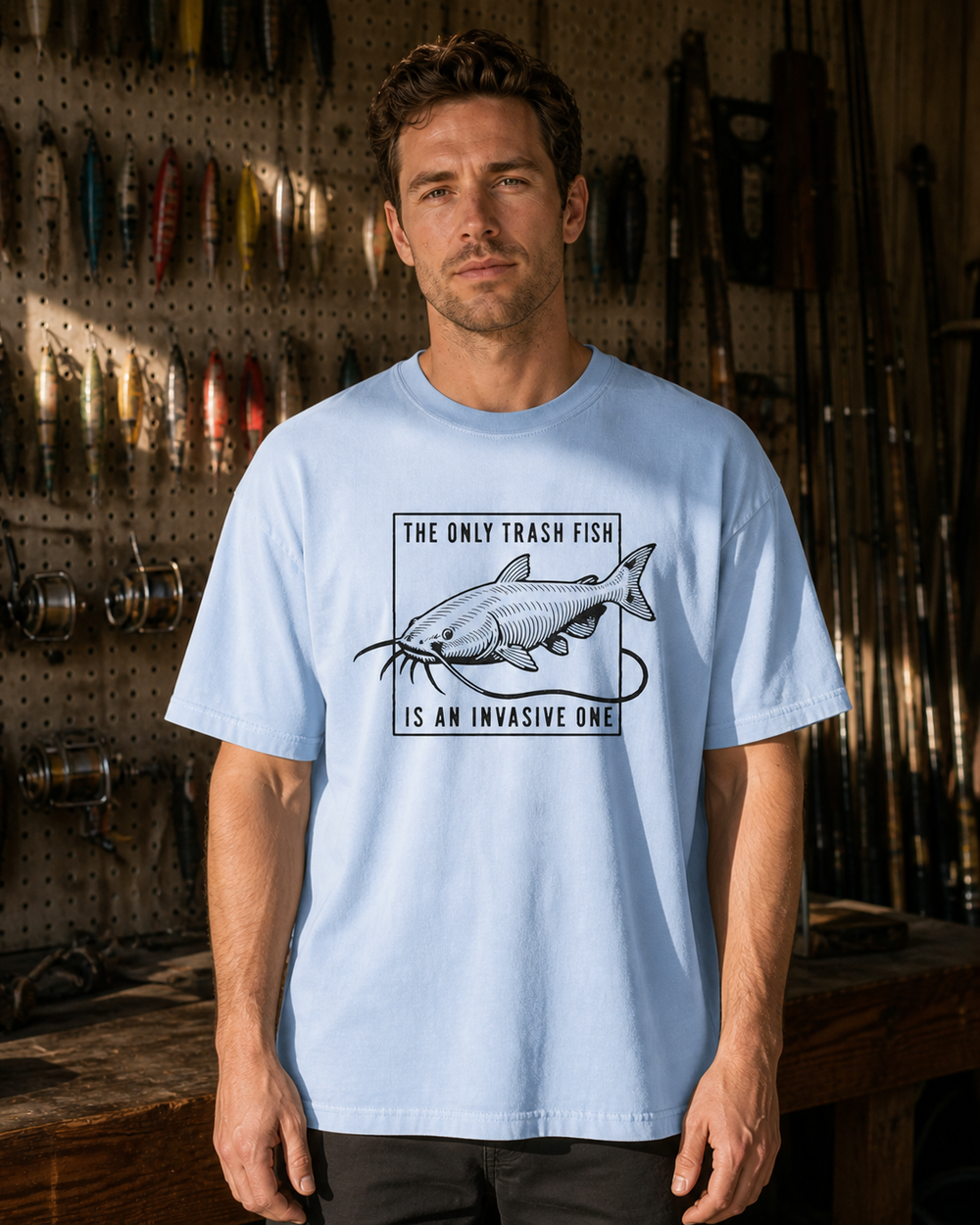 The Only Trash Fish washed tee — washed light blue, worn, front
