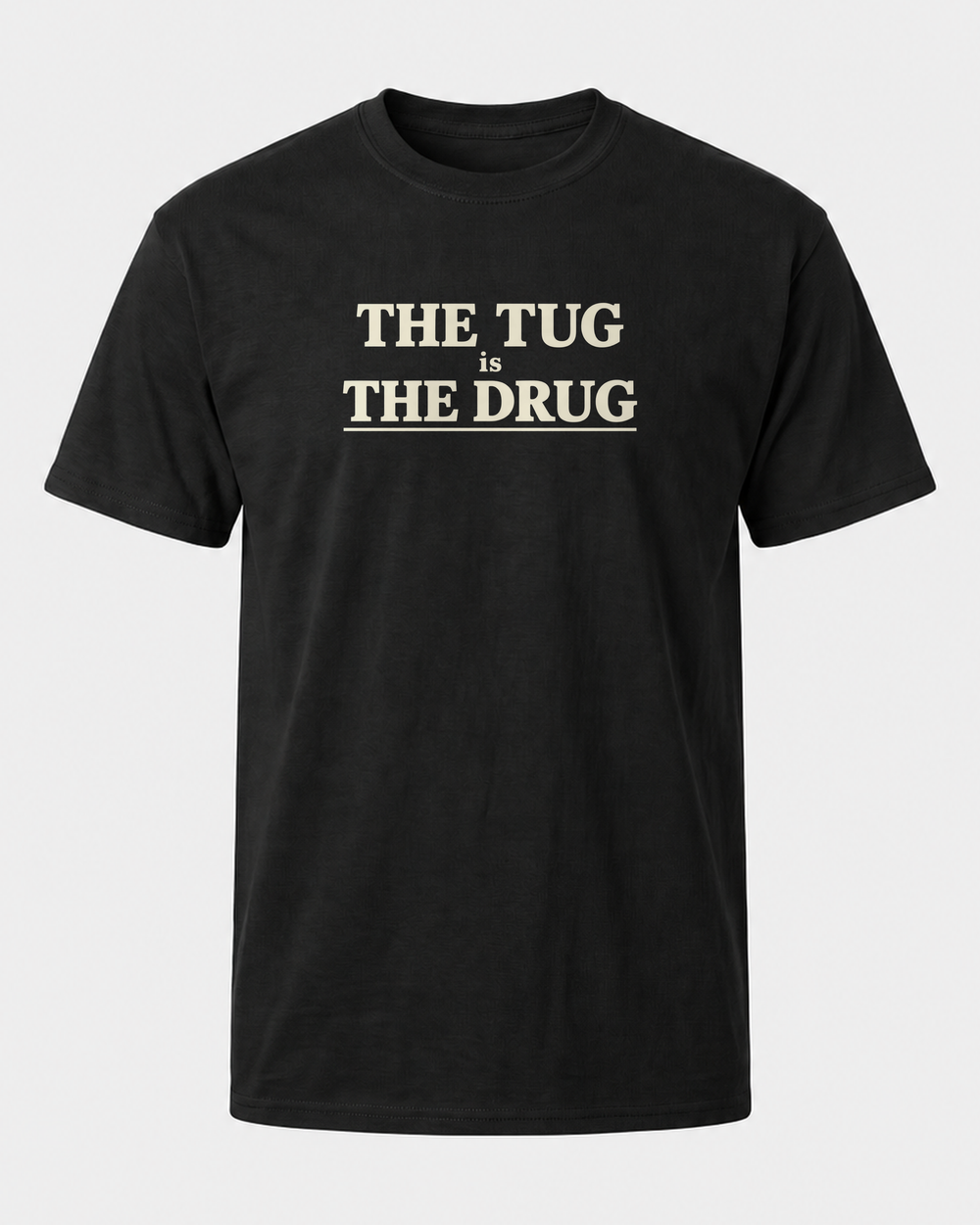 The Tug Is The Drug Stacked tee — black, front