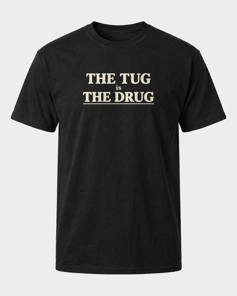 The Tug Is The Drug Stacked tee — black, front