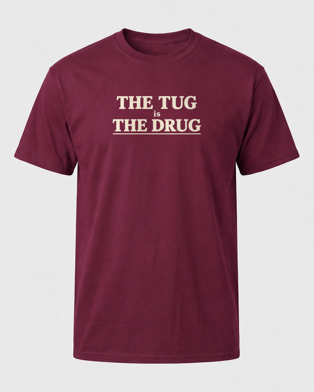The Tug Is The Drug Stacked tee — maroon, front