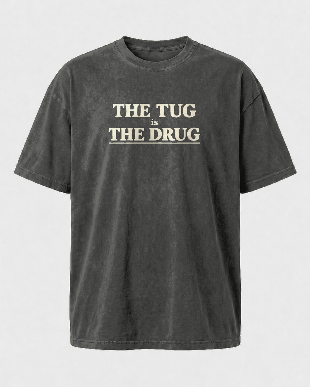 The Tug Is The Drug Stacked washed tee — washed black, front