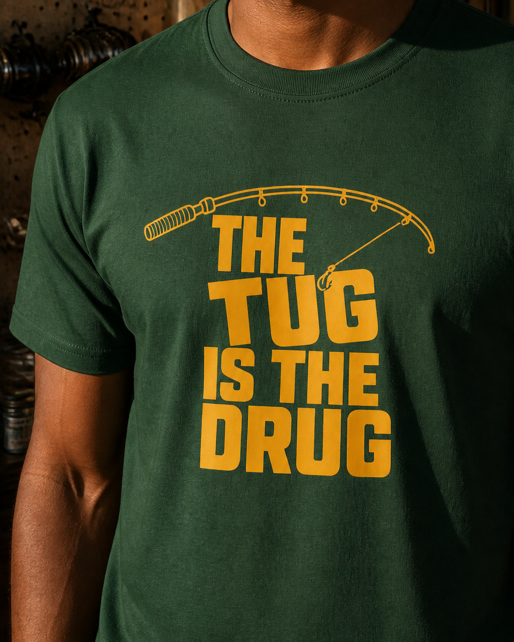 The Tug Is The Drug (free) tee — forest, worn, side