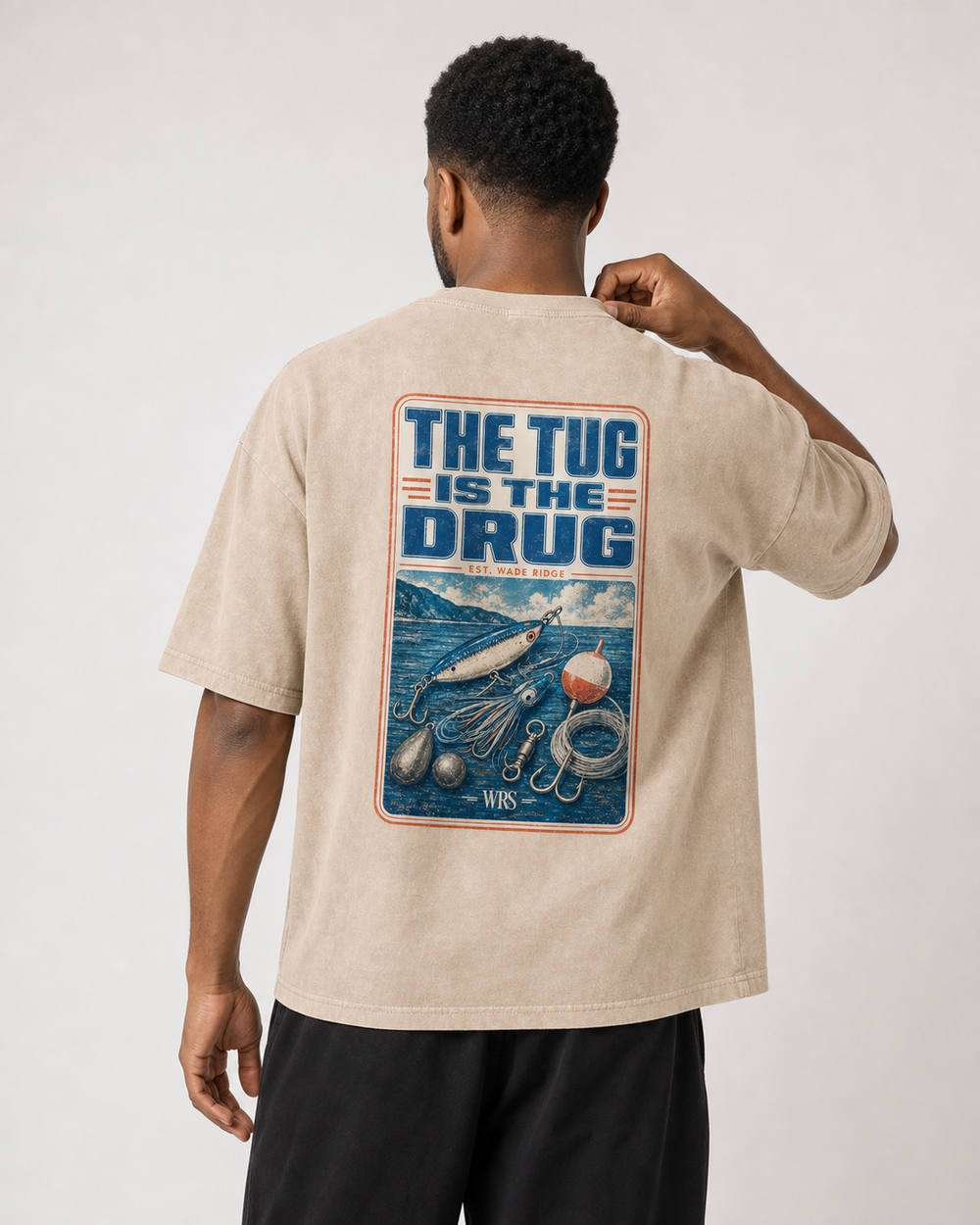 The Tug Is The Drug — Tackle Box Poster washed tee — washed bone, worn, front