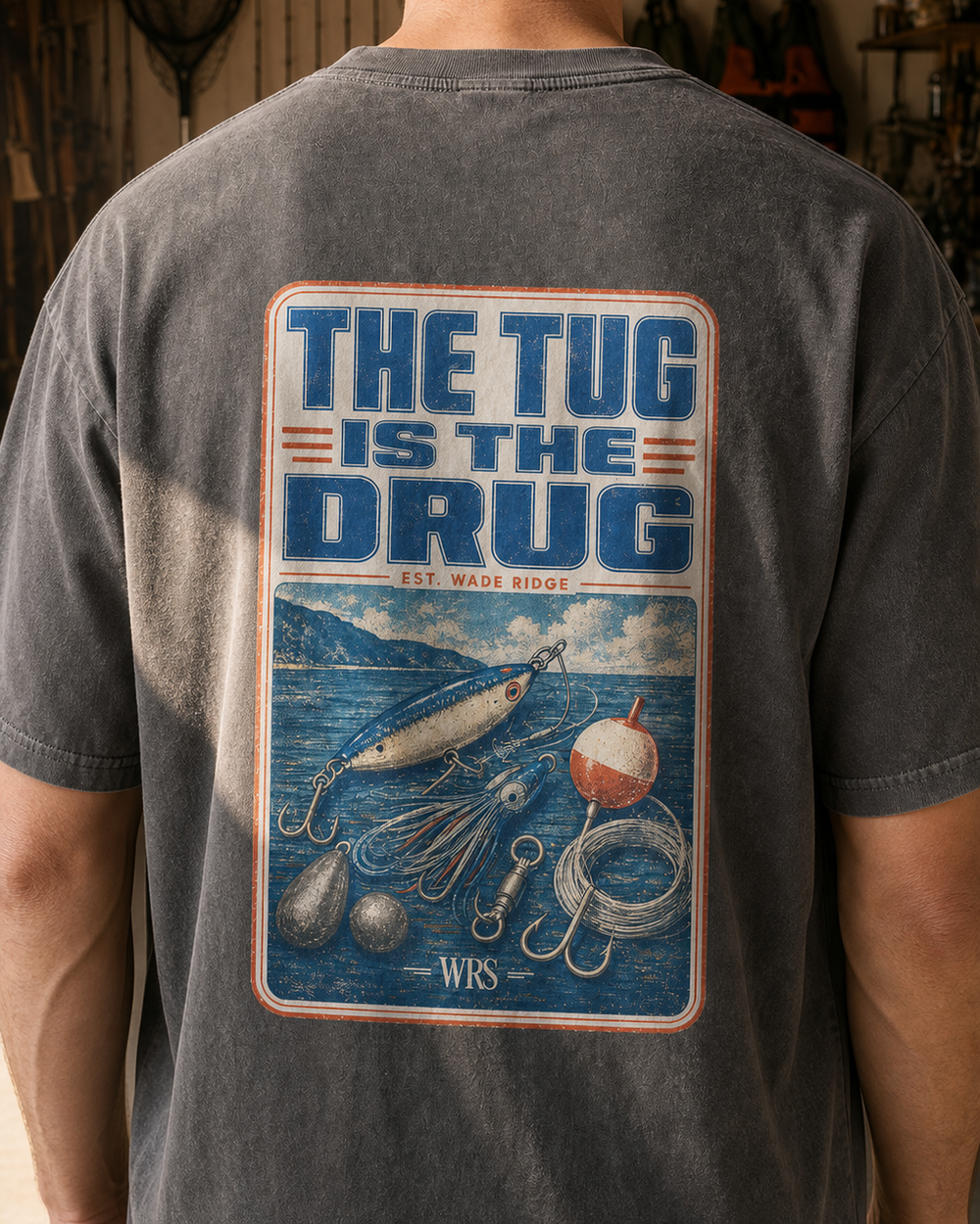 The Tug Is The Drug — Tackle Box Poster washed tee — washed black, worn, side