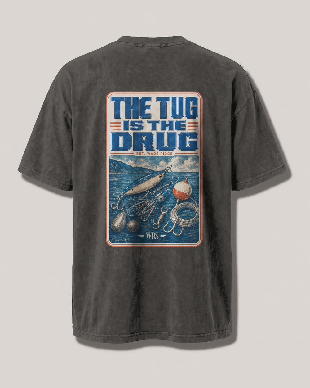 The Tug Is The Drug — Tackle Box Poster washed tee — washed black, front