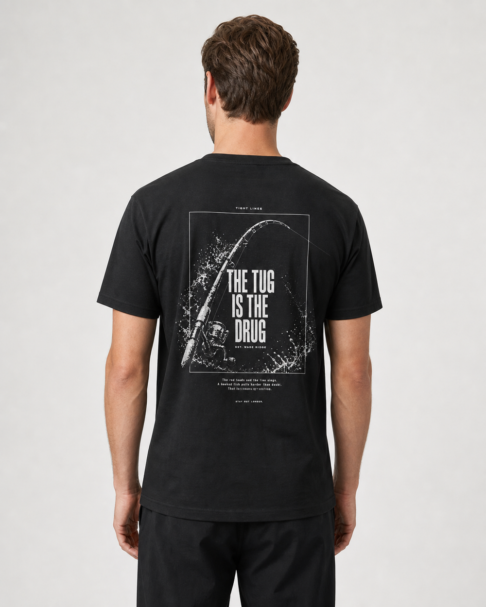 The Tug Is The Drug — Rod Under Load tee — black, worn, front