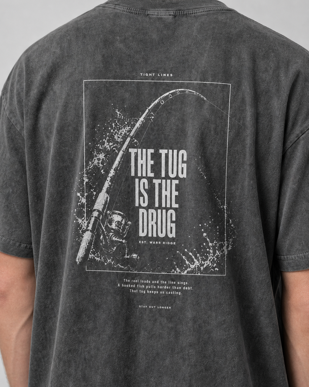 The Tug Is The Drug — Rod Under Load washed tee — washed black, worn, side