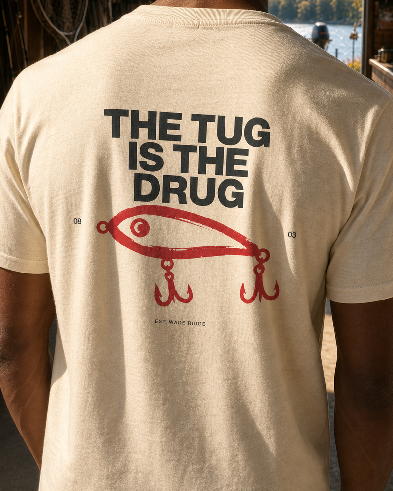 The Tug Is The Drug — Brushed Lure tee — bone, worn, side