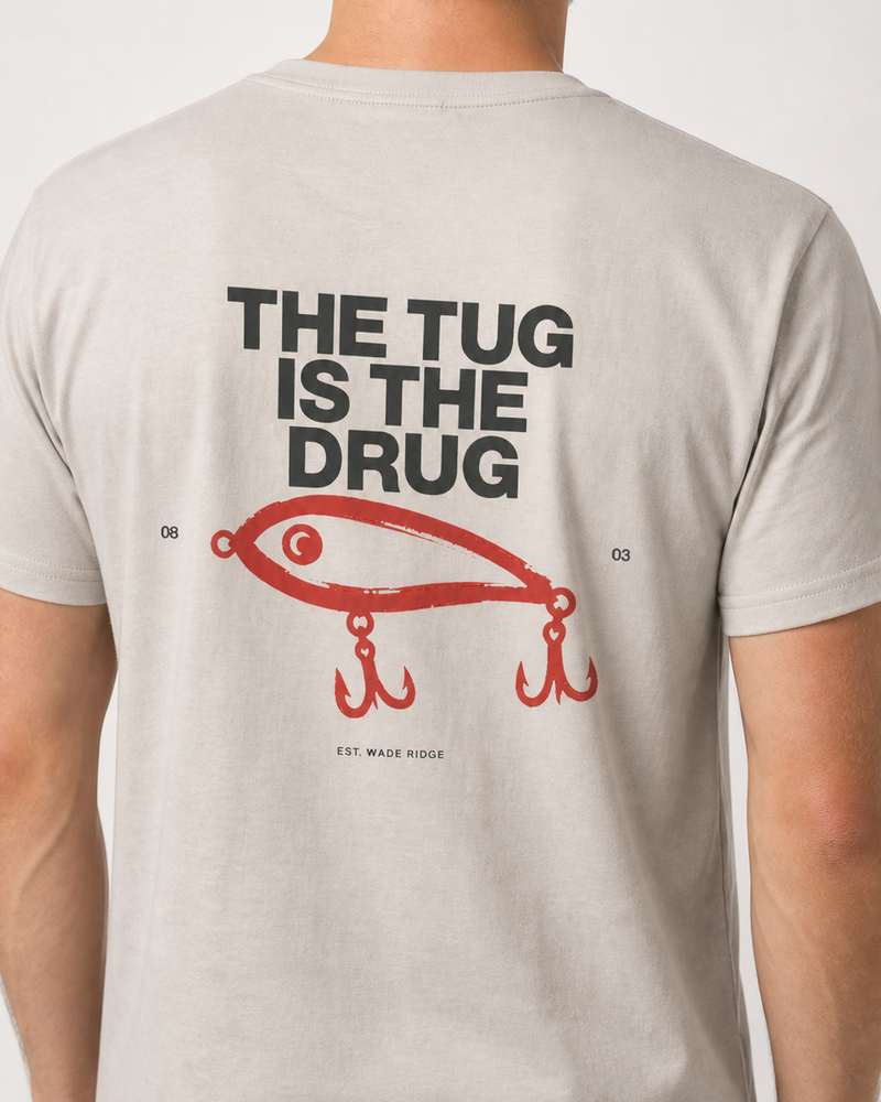 The Tug Is The Drug — Brushed Lure tee — sand, worn, side