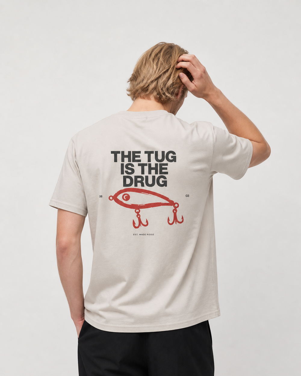 The Tug Is The Drug — Brushed Lure tee — sand, worn, front
