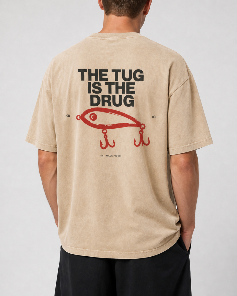 The Tug Is The Drug — Brushed Lure washed tee — washed bone, worn, side